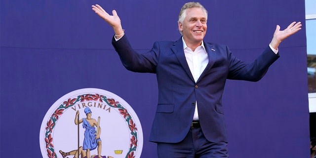 Democratic gubernatorial candidate, former Virginia Gov. Terry McAuliffe arrives for a rally in Richmond, Va., Saturday, Oct. 23, 2021. McAuliffe will face Republican Glenn Youngkin in the November election. (AP Photo/Steve Helber)