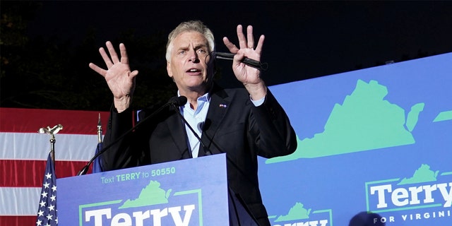 Candidate for Governor of Virginia Terry McAuliffe speaks during his campaign rally in Dumfries, Virginia October 21, 2021. REUTERS/Kevin Lamarque