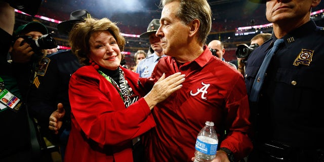 Alabama Crimson Tide head coach Nick Saban celebrates with his wife Terry after defeating the Georgia Bulldogs in overtime to win the CFP National Championship presented by AT&T at Mercedes-Benz Stadium on January 8, 2018 in Atlanta, Georgia.  Alabama won 26-23.