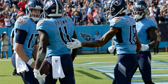 Tennessee Titans quarterback Ryan Tannehill (17) celebrates with wide receiver A.J. Brown (11) after they combined for a 24-yard touchdown pas against the Kansas City Chiefs in the first half of an NFL football game Sunday, Oct. 24, 2021, in Nashville, Tenn.