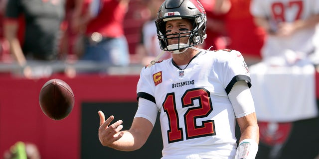 Quarterback Tom Brady #12 of the Tampa Bay Buccaneers warms up before the game against the Atlanta Falcons at Raymond James Stadium on September 19, 2021 in Tampa, Florida.