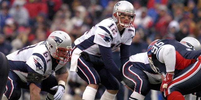 New England Patriots quarterback Tom Brady calls out signals at the line during a game against the Buffalo Bills at Ralph Wilson Stadium in Orchard Park, New York on December 11, 2005. New England won the game 35-7.