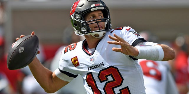 Tampa Bay Buccaneers quarterback Tom Brady (12) throws a pass against the Miami Dolphins during the first half of an NFL football game Sunday, Oct. 10, 2021, in Tampa, Florida.