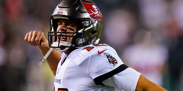 Tampa Bay Buccaneers quarterback Tom Brady shouts as he runs on to the field before an NFL football game against the Philadelphia Eagles Oct. 14 in Philadelphia.