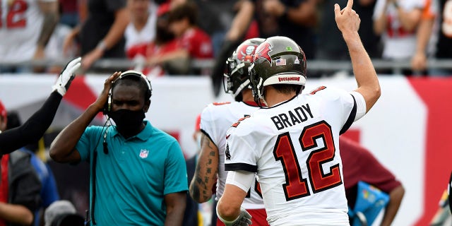 Tampa Bay Buccaneers quarterback Tom Brady (12) reacts after throwing his 600th career touchdown pass during the first half against the Chicago Bears Sunday, Oct. 24, 2021, in Tampa, Fla.