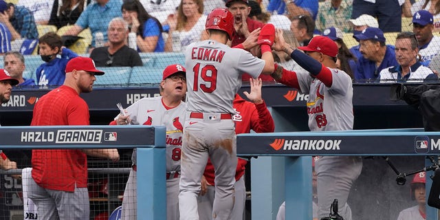 St.  Louis Cardinals' Tommy Edman (19) celebrates celebration in excavation after hitting a wild field thrown by Los Angeles Dodgers starting pitcher Max Scherzer during the first innings of a baseball game in the National League Wild Card Wednesday, October 6, 2021 , in Los Angeles.