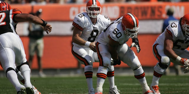 Trent Dilfer #8 and Jeff Faine #50 of the Cleveland Browns at the line of scrimmage against the Cincinnati Bengals on Sept. 11, 2005 at the Browns stadium in Cleveland, Ohio.