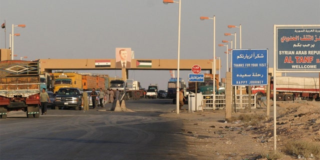 FILE - Cars wait in 2004 at a checkpoint at the Syrian-Iraqi border point of Al-Tanf, 270kms northeast of Damascus. (Photo: LOUAI BESHARA/AFP via Getty Images)