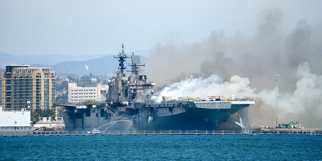 A fire aboard the amphibious assault ship USS Bonhomme Richard at Naval Base San Diego, July 12, 2020. 