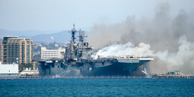 A fire aboard the amphibious assault ship USS Bonhomme Richard at Naval Base San Diego, July 12, 2020. 