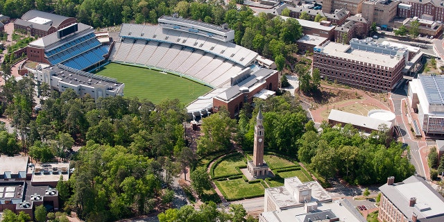 CHAPEL HILL, NC - APRIL 21: An aerial view of the University of North Carolina campus including Kenan Stadium (left) and the Morehead-Patterson Bell Tower (center) on April 21, 2013 in Chapel Hill, North Carolina. (Photo by Lance King/Getty Images)