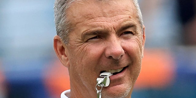 Head coach Urban Meyer of the Jacksonville Jaguars watches warm-ups before the game against the Denver Broncos at TIAA Bank Field on September 19, 2021 in Jacksonville, Florida.