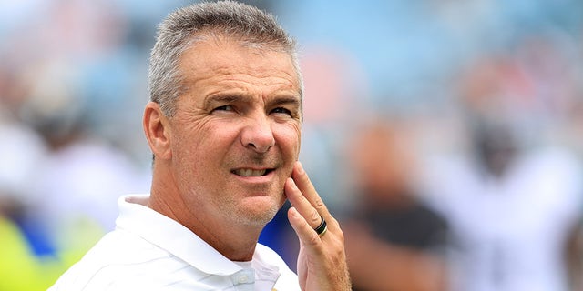 Jacksonville Jaguars head coach Urban Meyer watches warm-ups during the game at TIAA Bank Field on September 19, 2021 in Jacksonville, Florida.