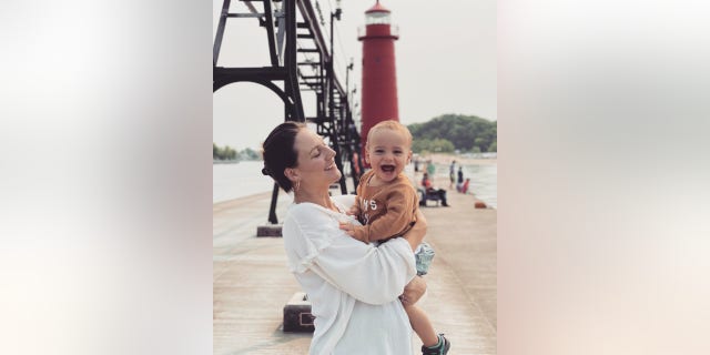 Vanessa Santos pictured on vacation with her son in Michigan,