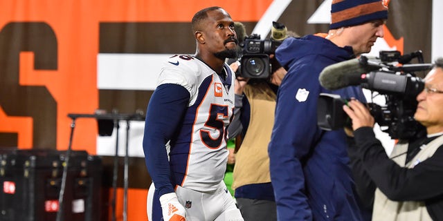 Denver Broncos outside linebacker Von Miller walks off the field after an injury during the first half of the team's NFL football game against the Cleveland Browns, Thursday, Oct. 21, 2021, in Cleveland.