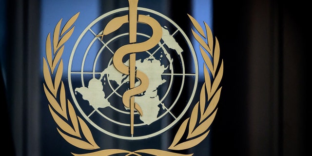 This photograph taken on March 5, 2021 shows a sign of the World Health Organization (WHO) at the entrance of their headquarters in Geneva amid the Covid-19 coronavirus outbreak. 