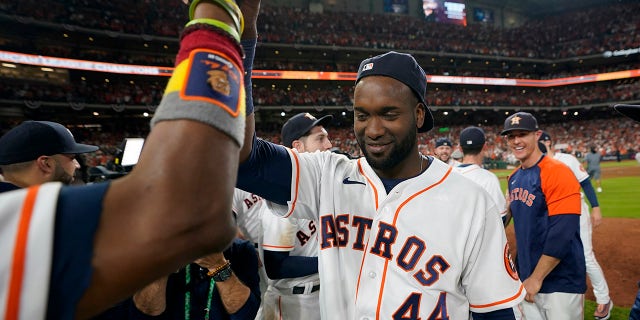 Houston Astros designated hitter Yordan Alvarez celebrates after their win against the Boston Red Sox in Game 6 of baseball's American League Championship Series Friday, oct. 22, 2021, in Houston. The Astros won 5-0, to win the ALCS series in game six.