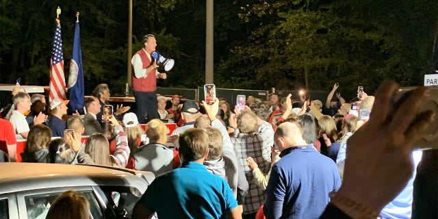 Glenn Youngkin speaks to supporters outside after his speech.