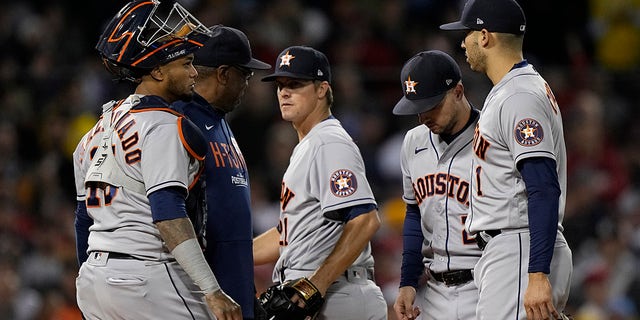 Houston Astros starting pitcher Zack Greinke is taken out of the game against the Boston Red Sox during the second inning in Game 4 of baseball's American League Championship Series Tuesday, Oct. 19, 2021, in Boston.