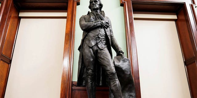 A statue of former U.S. President Thomas Jefferson is pictured in the council chambers in City Hall after a vote to have it removed in the Manhattan borough of New York City, New York, U.S., October 19, 2021.