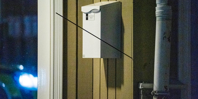 An arrow is seen in a wall after an attack in Kongsberg, Norway, on Wednesday.