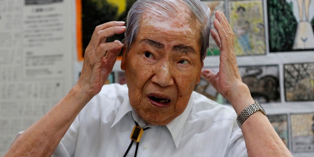 In this photo from August 2013, Sunao Tsuboi, then co-chairperson of Japan Confederation of A-and H-Bomb Sufferers Organizations, speaks during an interview at his office in Hiroshima, western Japan. 