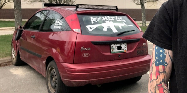 The plate on this Ford Focus replaces the O in focus with a U.