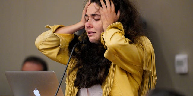 Hannah Kaye paused to recompose herself before giving a victim impact statement during John T. Earnest's sentencing hearing in Superior Court, Thursday, Sept. 30, 2021, in San Diego. (Nelvin C. Cepeda/The San Diego Union-Tribune via AP)