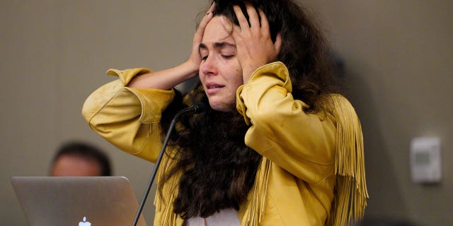 Hannah Kaye paused to recompose herself before giving a victim impact statement during John T. Earnest's sentencing hearing in Superior Court, Thursday, Sept. 30, 2021, in San Diego. (Nelvin C. Cepeda/The San Diego Union-Tribune via AP)