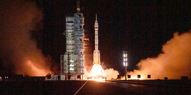 The Shenzhou-13 carried by a Long March-2F rocket launches with three astronauts from China Manned Space Agency on board early on October 16, 2021 from the Jiuquan Satellite Launch Center in the Gobi Desert near Jiuquan, China. 