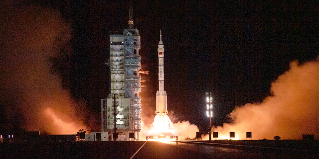 The Shenzhou-13 carried by a Long March-2F rocket launches with three astronauts from China Manned Space Agency on board early on October 16, 2021 from the Jiuquan Satellite Launch Center in the Gobi Desert near Jiuquan, China.