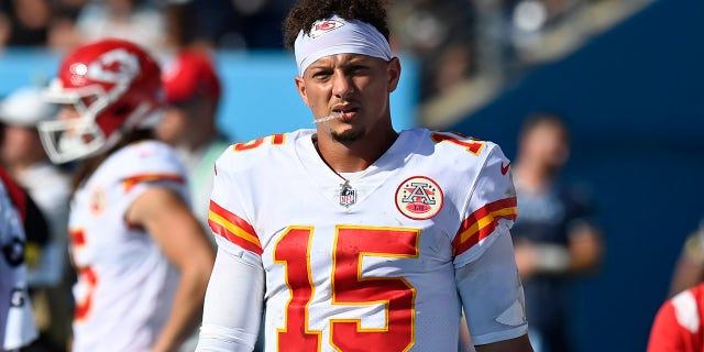 Kansas City Chiefs quarterback Patrick Mahomes (15) walks on the sideline after leaving the medical tent following a hard hit in the second half of an NFL football game against the Tennessee Titans Sunday, Oct. 24, 2021, in Nashville, Tenn.