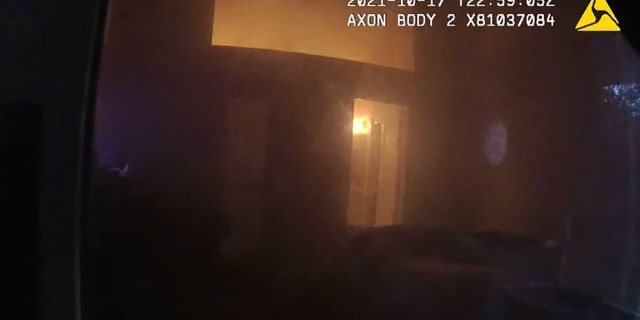 Dawson entered the smoke-filled home and saw a small head pop up from underneath a blanket.