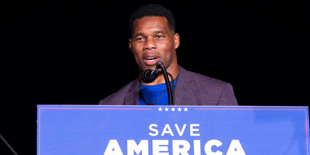 GOP senatorial candidate Herschel Walker speaks at a rally headlined by former President Donald Trump, in Perry, Georgia, Sept. 25, 2021.