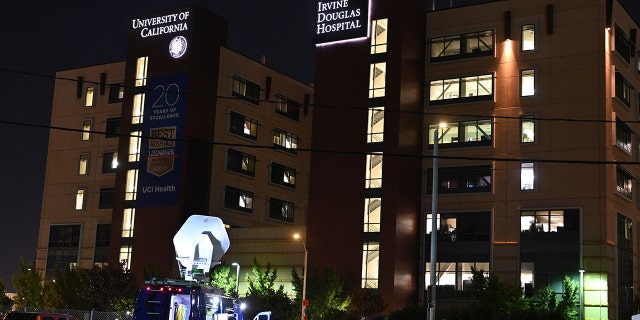 News vans park outside the University of California Irvine (UC Irvine) Medical Center, where former President Bill Clinton is hospitalized, in Orange, California.