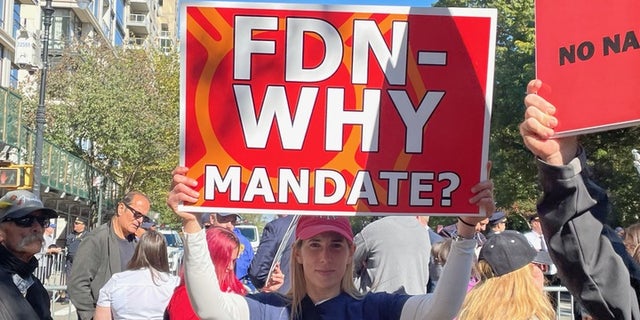 Protestors gathered outside Gracie Mansion Thursday morning to protest Mayor Bill de Blasio's vaccine mandate. The mandate goes into effect starting Oct. 29, 2021.