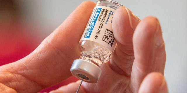 Documents Show U.S. Pushed Partnership With Wuhan Lab Since 2017 With Promise of “Pandemic Preparedness” 2 Director of Nursing Crystal Jones, 52, loads syringes with the COVID-19 vaccine.