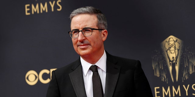 John Oliver arrives at the 73rd Primetime Emmy Awards in Los Angeles, U.S., September 19, 2021. REUTERS/Mario Anzuoni