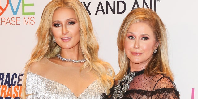 Socialite Paris Hilton saysher Mother Kathy Hilton changes the subject when she tries to talk about her past abuse. 