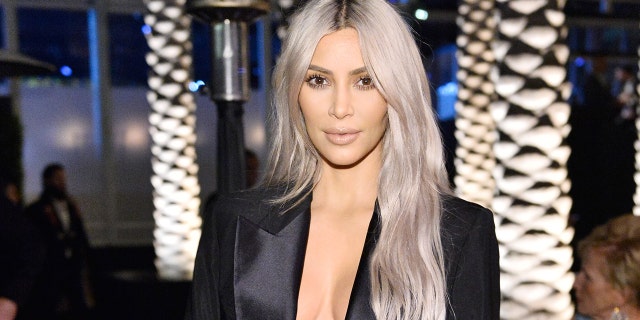 Kim Kardashian West donning silver hair back in 2017.