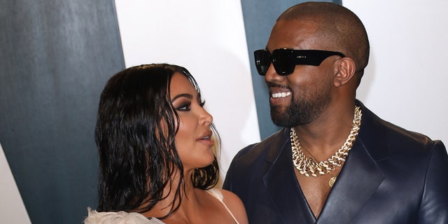 Kim Kardashian and Kanye West attend the 2020 Vanity Fair Oscar Party at Wallis Annenberg Center for the Performing Arts in Feb. 2020 in Beverly Hills, California. 