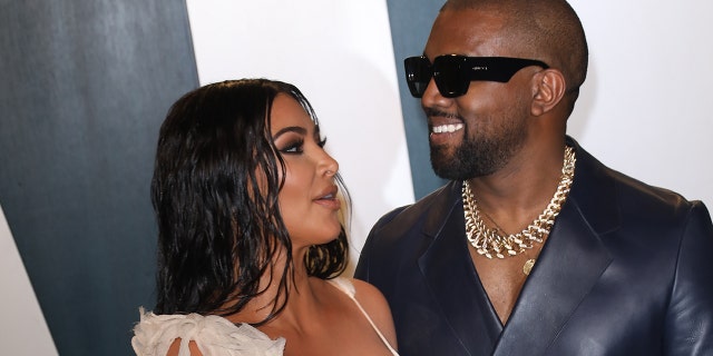 Kim Kardashian and Kanye West attend the 2020 Vanity Fair Oscar Party at Wallis Annenberg Center for the Performing Arts in Feb. 2020 in Beverly Hills, California.