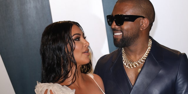 Kim Kardashian and Kanye West attend the 2020 Vanity Fair Oscar Party at Wallis Annenberg Center for the Performing Arts in Feb. 2020 in Beverly Hills, California. 