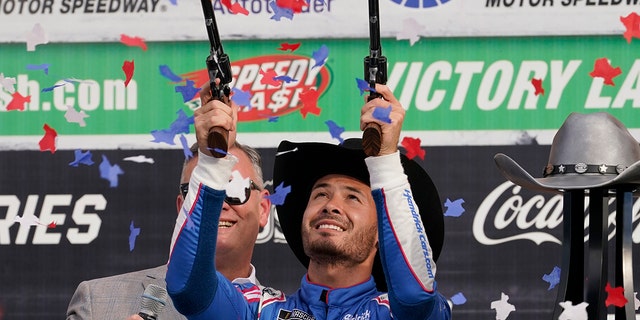 Kyle Larson celebrates the Texas Motor Speedway way after Sunday's championship final-qualifying win.