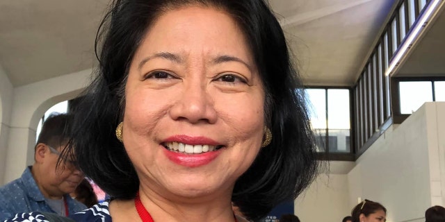 Maria Ambrocio, 58, died surrounded by family and friends after being brain-dead from a head injury she sustained when an alleged assailant knocked her to the ground in Times Square in New York City, according to local reports.