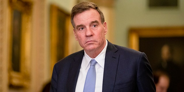 Sen. Mark Warner (D-VA) returns to the Senate floor following a recess in the Senate impeachment trial of President Donald Trump in January 2020. Warner said that Intelligence was accurate in showing the trajectory of the Taliban's takeover of Afghanistan. 