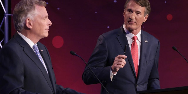 ALEXANDRIA, VIRGINIA - SEPTEMBER 28: Former Virginia Gov. Terry McAuliffe (L) (D-VA) and Republican gubernatorial candidate Glenn Youngkin (R) particpate in a debate hosted by the Northern Virginia Chamber of Commerce September 28, 2021 in Alexandria, Virginia. The gubernatorial election is November 2. (Photo by Win McNamee/Getty Images)