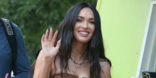 Megan Fox is known for her long black hair. 