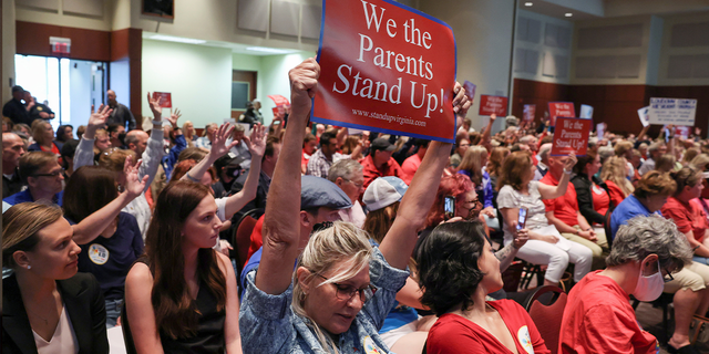 Parents and community members attend a Loudoun County School Board meeting, just 40 minutes from Fairfax, Virginia.