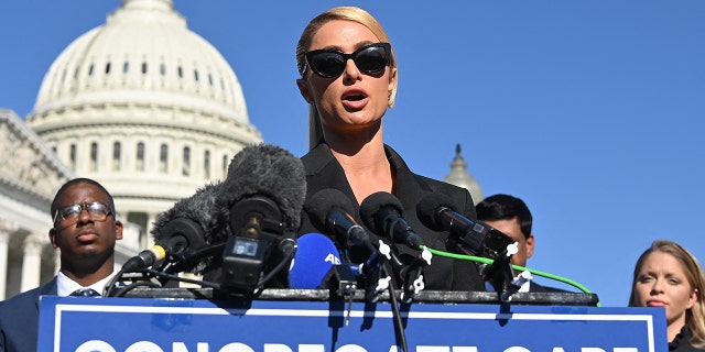 Paris Hilton joins lawmakers for a press conference on legislation to protect children placed in congregate care facilities, at the U.S. Capitol on Oct. 20, 2021.